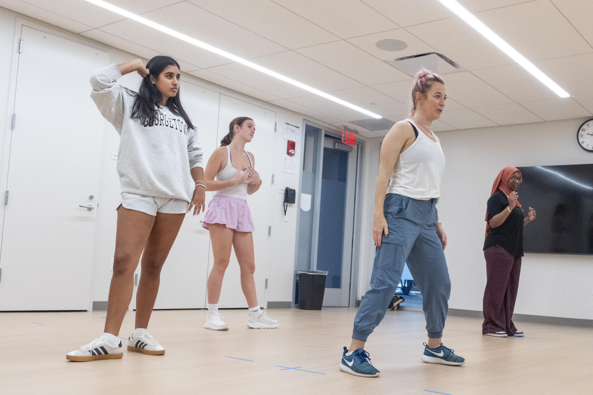Upper School students learn freestyle movements in dance class.
