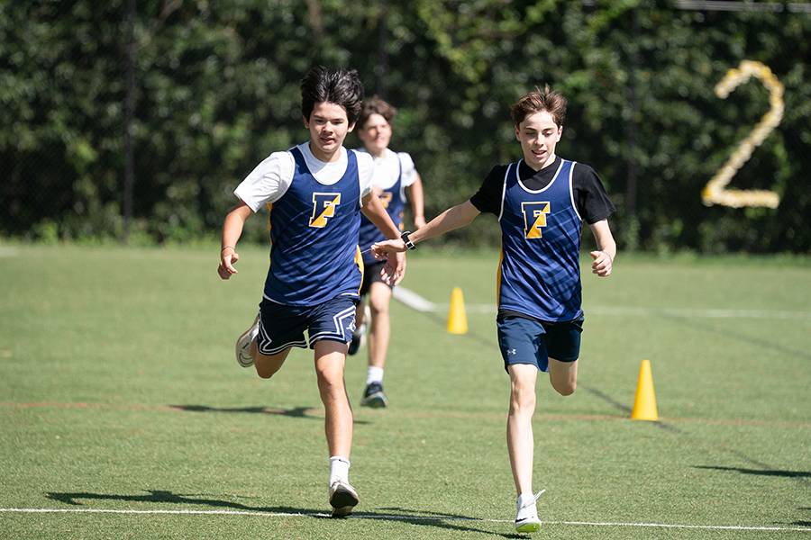 photo of students playing soccer