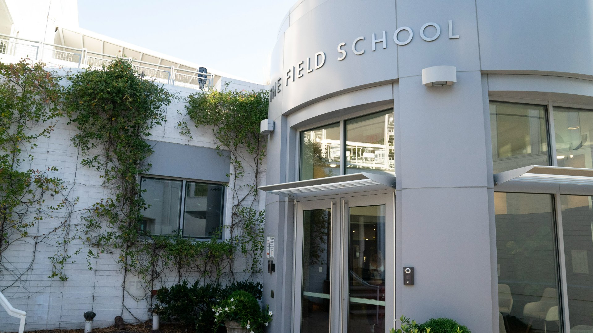 photo of the front door of the school bulding, where you will start your school tour