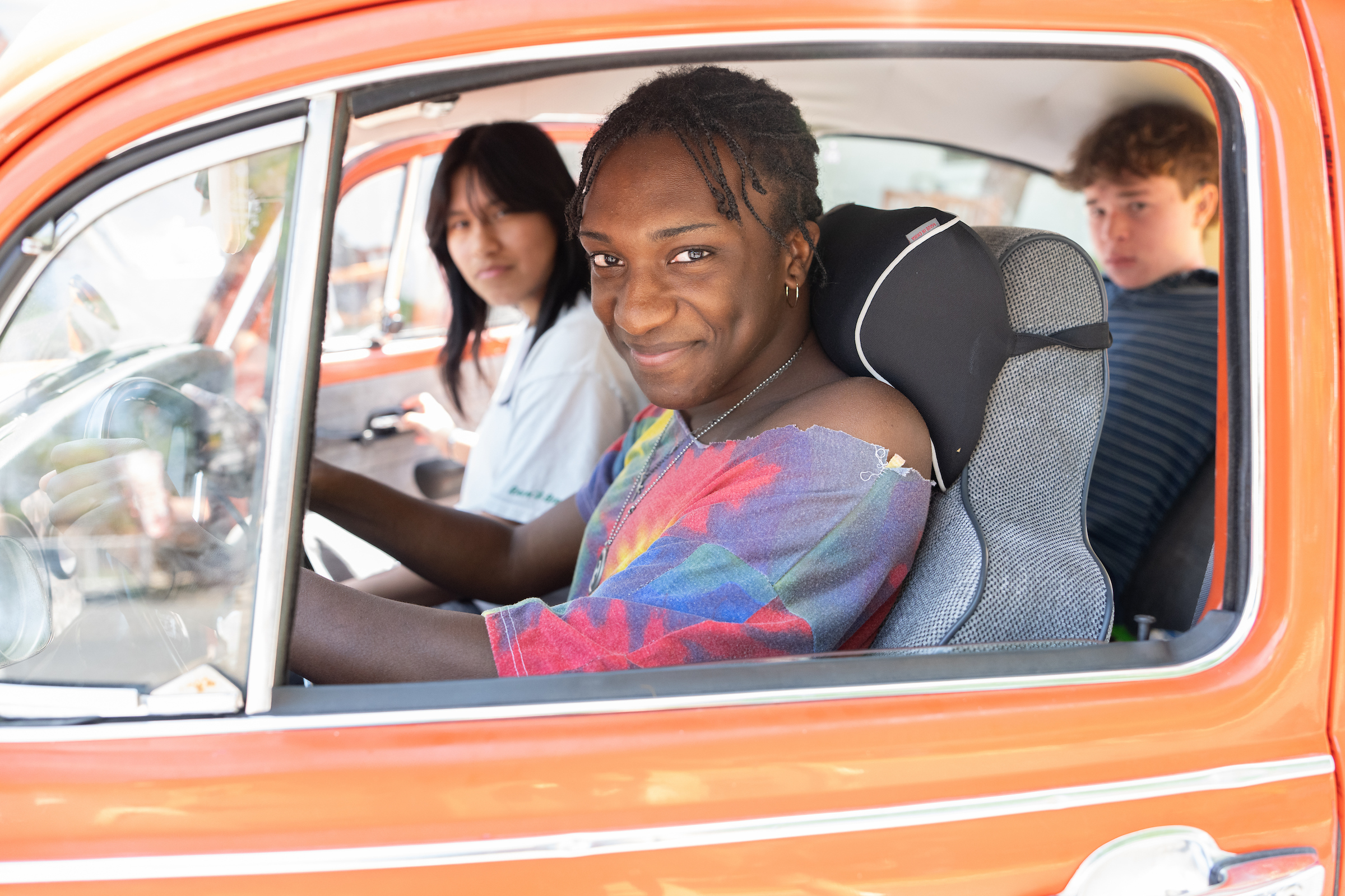photo of student and teahcer looking at film negatives