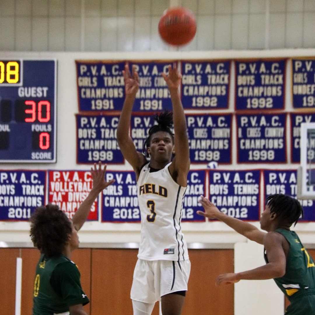 photo of school athlete playing basketball