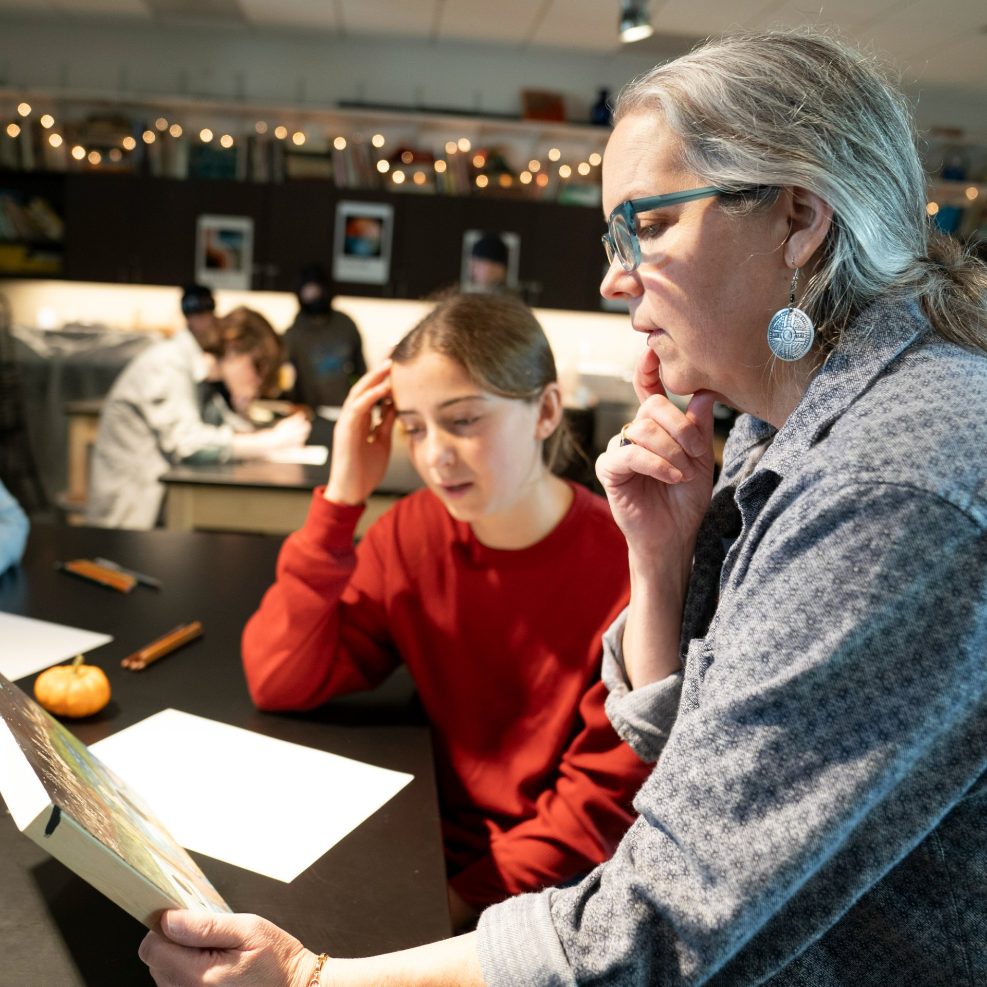 photo of teacher with a student