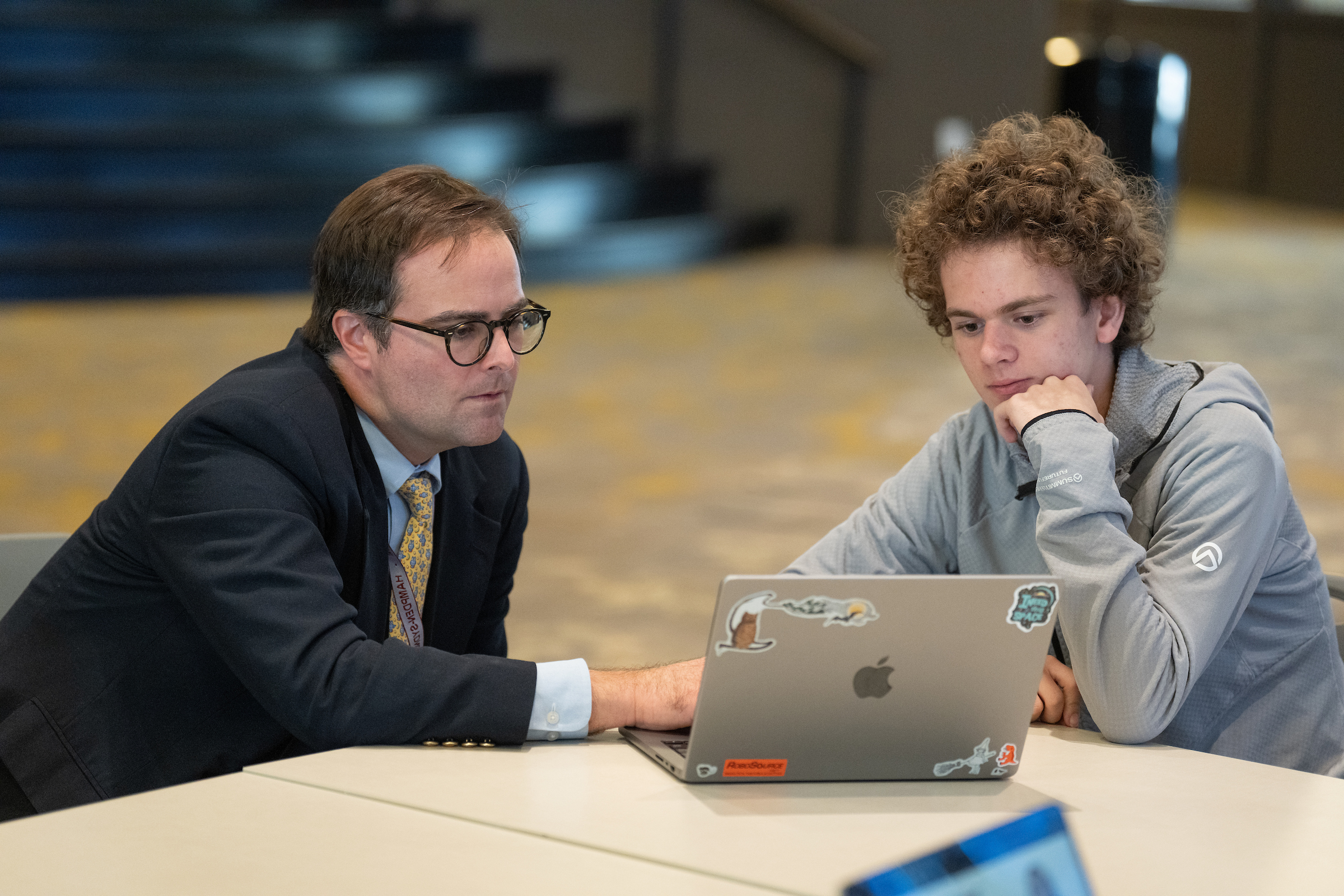 photo of student playing guitar