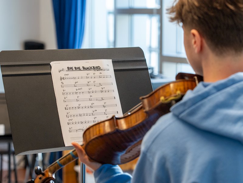 Student playing violin